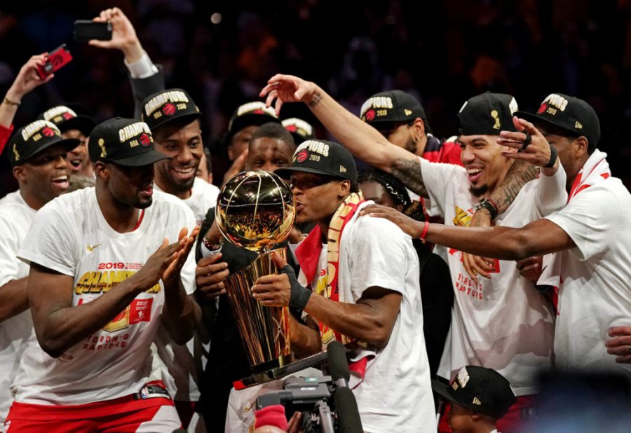 Jun 13, 2019; Oakland, CA, USA; Toronto Raptors guard Kyle Lowry (7) kisses the Larry OBrien Trophy after beating the Golden State Warriors in game six of the 2019 NBA Finals at Oracle Arena. Mandatory Credit: Kyle Terada-USA TODAY Sports