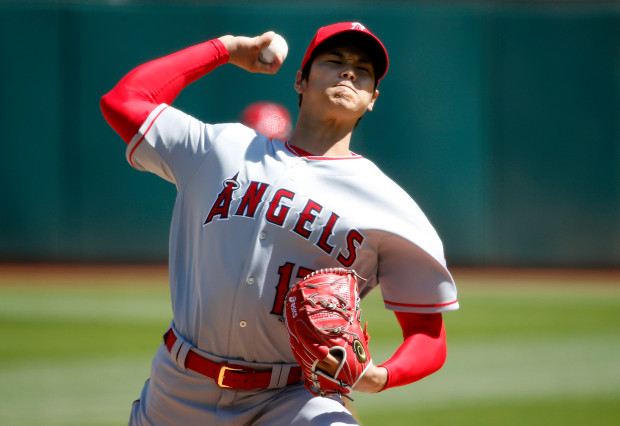 From The Mercury News: Shohei Ohtani of the Los Angeles Angels (17) pitches in the first inning of his his first MLB start against the Oakland Athletics at the Oakland Coliseum in Oakland, Calif., on Sunday, April 1, 2018. (Karl Mondon/Bay Area News Group)