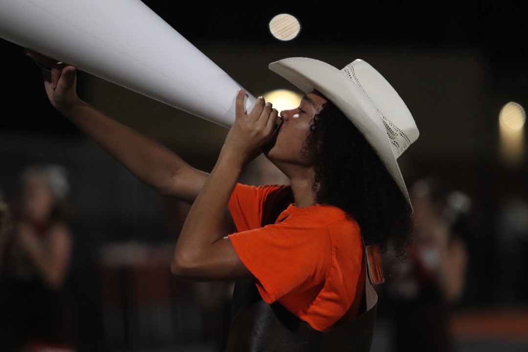 Senior Jacobi Robinson shows his school spirit with his new yell leader skills